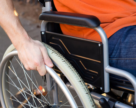 injured person in wheelchair